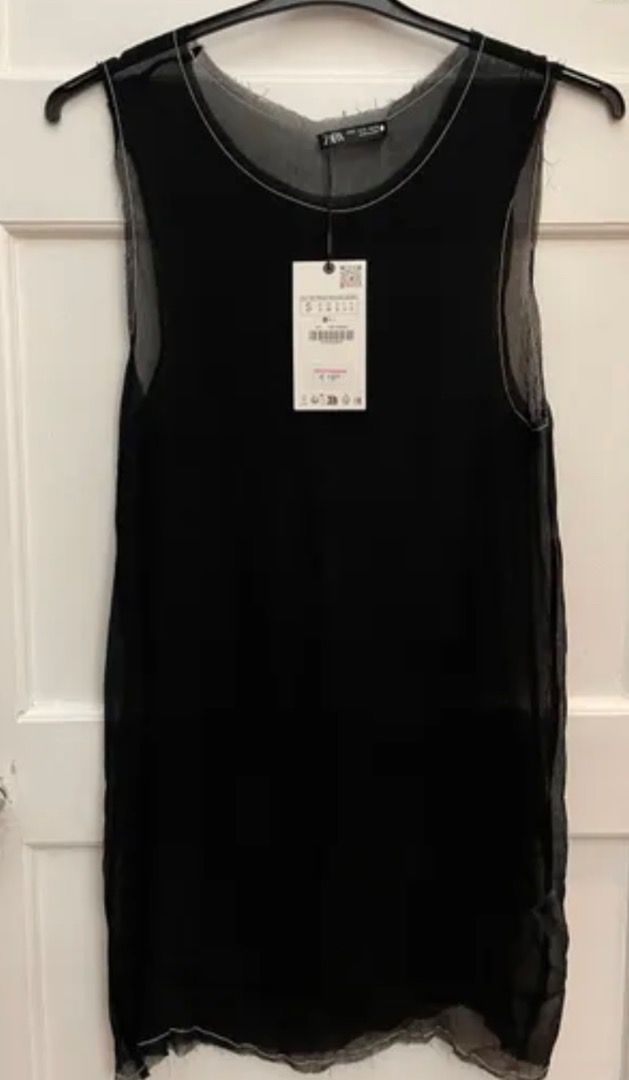 Zara sheer black sleeveless top (Category: Shirts) located in Taguig. Submitted by cheks07 (Listing ID 1410366434, Image 1). Description: Zara sheer black sleeveless top.