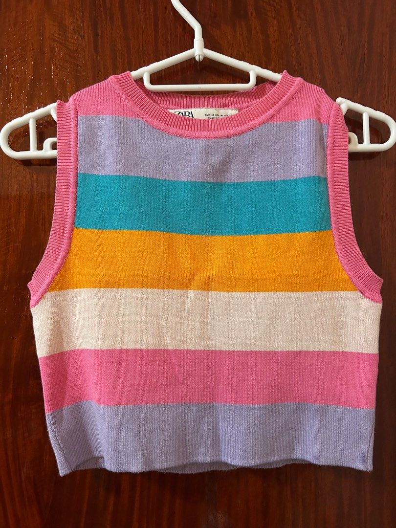 Zara Striped Knit Top (Category: Blouses) located in Quezon City. Submitted by st5ff (Listing ID 1410253969, Image 1). Description: - Zara knit top - Size M - Sleeveless - Round neckline - Colorful striped design (pink, purple, blue, yellow, white) .