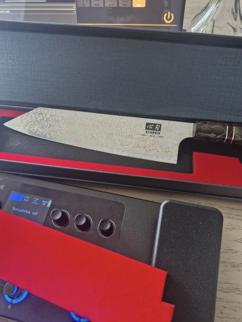 23.5cm SG2 Copper Damascus Kiritsuke (Category: Knives & Chopping Boards) located in Manila. Submitted by eaaee (Listing ID 1410507091, Image 2). Description: copper damascus cladding with a SG2 core steel -resin handle -stainless -SG2 core steel so it has an HRC of 62+-2 -23.5cm blade length * downpayment of 5,000 php is necessary -will take 7-10 days to arrive to the philippines (will give daily updates if needed) -I have the knife on hand righ