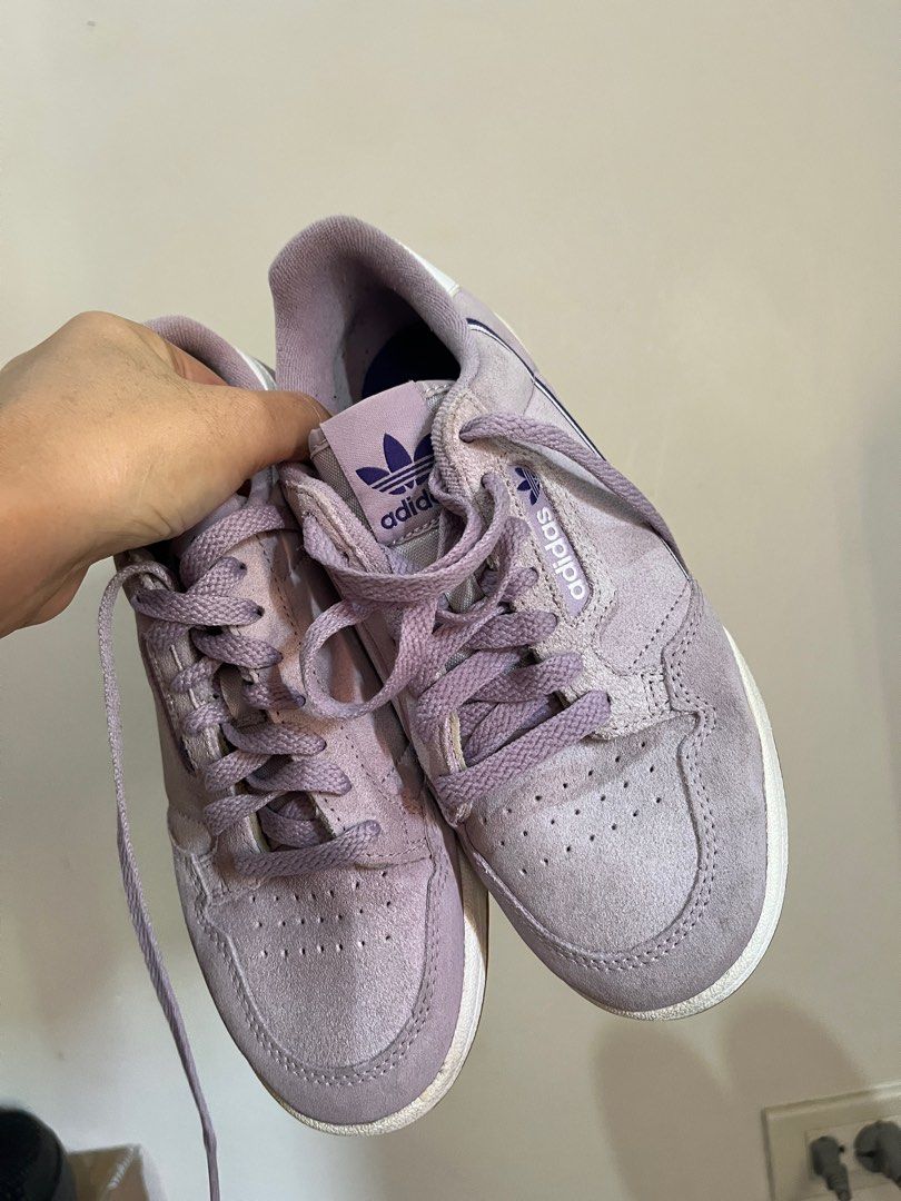 Adidas Continental 80s Sneakers (Category: Sneakers) located in Paranaque City. Submitted by aeyprel (Listing ID 1410515297, Image 1). Description: - Adidas Continental 80s sneakers - Lilac colorway - Adidas logo on tongue and side - Size: US 6, UK 4, JP 230 - Made in Indonesia - White sole with brown bottom - Lilac laces.