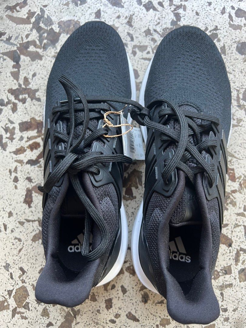 Adidas UBounce DNA Running Shoes - Black (Category: Sneakers) located in Manila. Submitted by loopbabies (Listing ID 1410481421, Image 3). Description: - Adidas UBounce DNA running shoes - Color: Black upper with white soles - Features Adidas logo - New with tags - Size available (indicated on tag) Bought from the US. Rfs is the item is just stored and not being used.