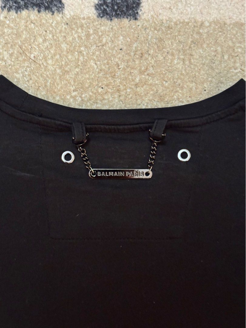 Balmain Paris Black T-shirt (Category: Tshirts & Polo Shirts ) located in Paranaque City. Submitted by passion_pluto (Listing ID 1410416592, Image 2). Description: - Black Balmain Paris T-shirt - Brand name printed on the chest - Features metal detail with brand name on the back - Made of soft material - Simple and stylish design - Perfect for everyday wear.
