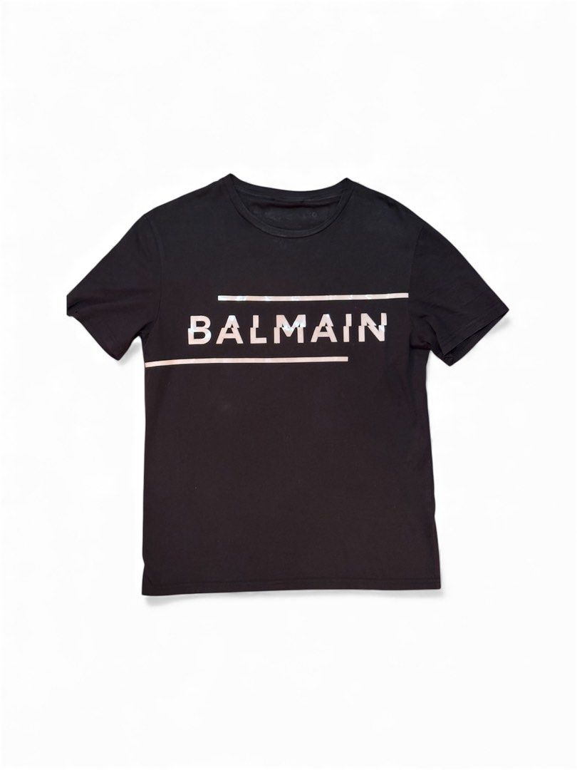 Balmain Paris Black T-shirt (Category: Tshirts & Polo Shirts ) located in Paranaque City. Submitted by passion_pluto (Listing ID 1410416592, Image 1). Description: - Black Balmain Paris T-shirt - Brand name printed on the chest - Features metal detail with brand name on the back - Made of soft material - Simple and stylish design - Perfect for everyday wear.