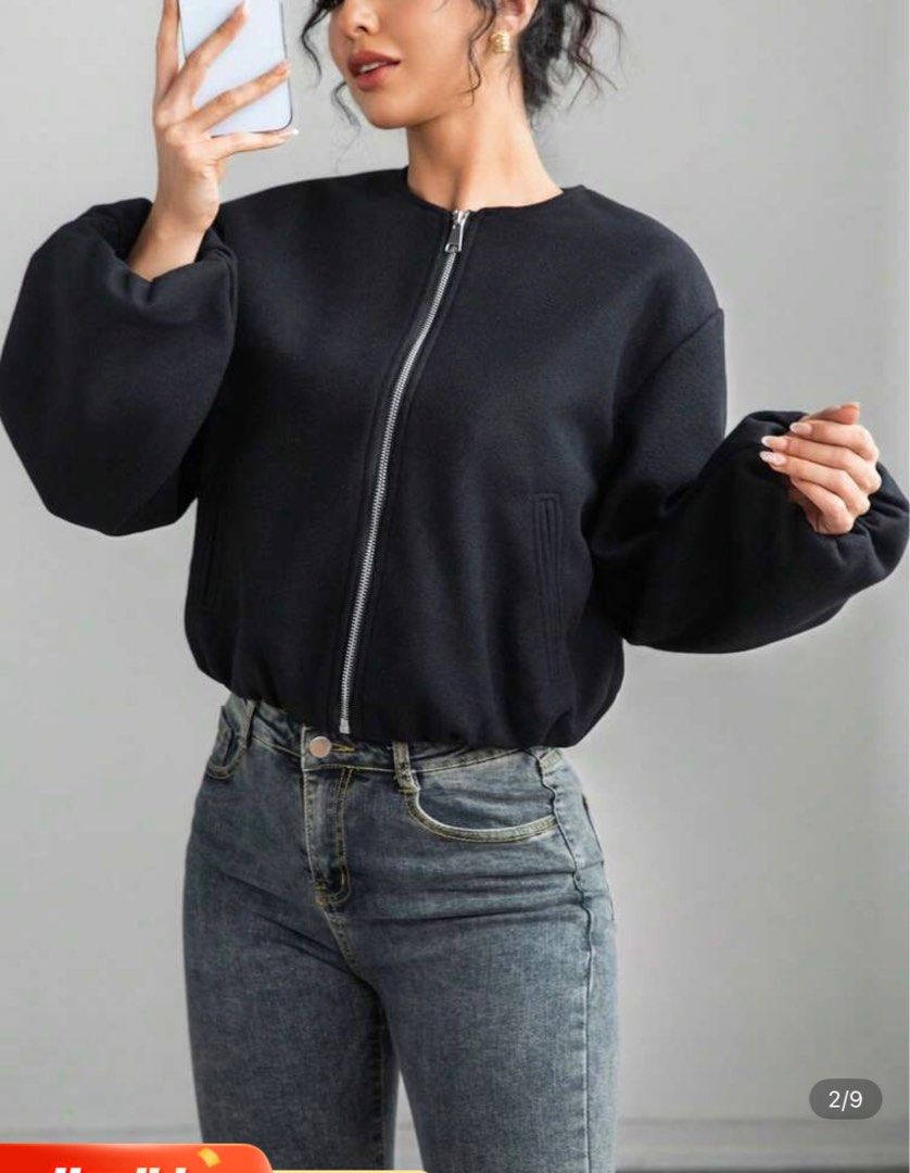 Black Bomber Jacket (Category: Coats, Jackets and Outerwear) located in Quezon City. Submitted by itemsbyj (Listing ID 1410395322, Image 2). Description: - Measurement: Shoulder - 18.5' ; Length - 21.3' ; Sleeve - 21.7 - Worn once for a few hours only for a trip - Made of thick, possibly wool-like material .