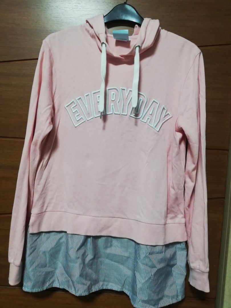 Bossini Everyday Hoodie - Size S (Category: Coats, Jackets and Outerwear) located in Malabon City. Submitted by ahn-ne (Listing ID 1410462078, Image 1). Description: - Pink Bossini hoodie - "EVERYDAY" print on front - Size S - Striped fabric detail at the bottom - Hood with white drawstrings .