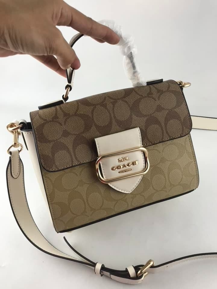 Coach Morgan Top Handle Crossbody Bag (Category: Luxury Bags & Wallets) located in Manila. Submitted by msddirectfactoryoutlet (Listing ID 1410407569, Image 1). Description: Size MORGAN TOP HANDLE 8 1/4" (L) x 6 1/4" (H) x 4 1/4" (W) .