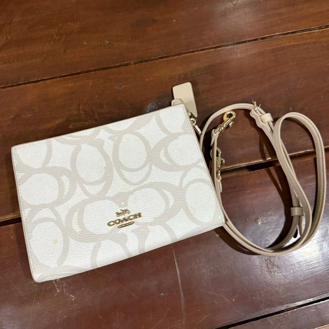 Coach Slim Crossbody Bag (Category: Cross-body Bags) located in Dasmarinas. Submitted by cess_declutters (Listing ID 1410450287, Image 2). Description: Never used Bought from Coach Outlet USA Issue: Stains due to storage Original Price: $89 (5000+php) Slightly negotiable 📍Dasmariñas, Cavite.