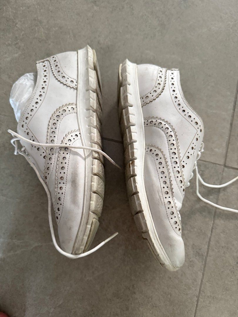 Cole Haan ZeroGrand White Brogue Shoes (Category: Loafers) located in Muntinlupa City. Submitted by el1b12345 (Listing ID 1410397755, Image 2). Description: - Cole Haan ZeroGrand brogue shoes - Size: 7 - Material: Leather and manmade upper, manmade lining - Made in Vietnam - Features: ZeroGrand logo on insole, classic brogue design with decorative perforations - mop: Gcash - mod: J&T/Lalamove - Pm if interested.