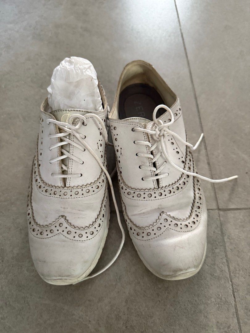 Cole Haan ZeroGrand White Brogue Shoes (Category: Loafers) located in Muntinlupa City. Submitted by el1b12345 (Listing ID 1410397755, Image 1). Description: - Cole Haan ZeroGrand brogue shoes - Size: 7 - Material: Leather and manmade upper, manmade lining - Made in Vietnam - Features: ZeroGrand logo on insole, classic brogue design with decorative perforations - mop: Gcash - mod: J&T/Lalamove - Pm if interested.