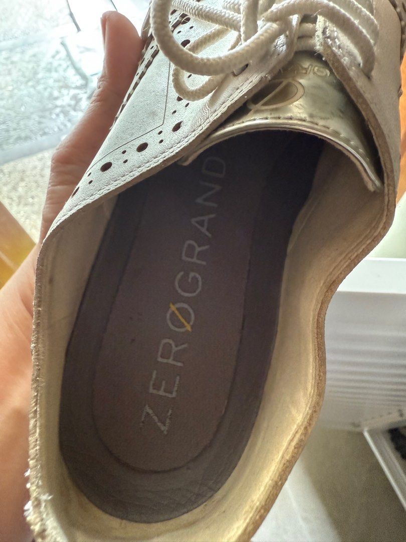 Cole Haan ZeroGrand White Brogue Shoes (Category: Loafers) located in Muntinlupa City. Submitted by el1b12345 (Listing ID 1410397755, Image 3). Description: - Cole Haan ZeroGrand brogue shoes - Size: 7 - Material: Leather and manmade upper, manmade lining - Made in Vietnam - Features: ZeroGrand logo on insole, classic brogue design with decorative perforations - mop: Gcash - mod: J&T/Lalamove - Pm if interested.