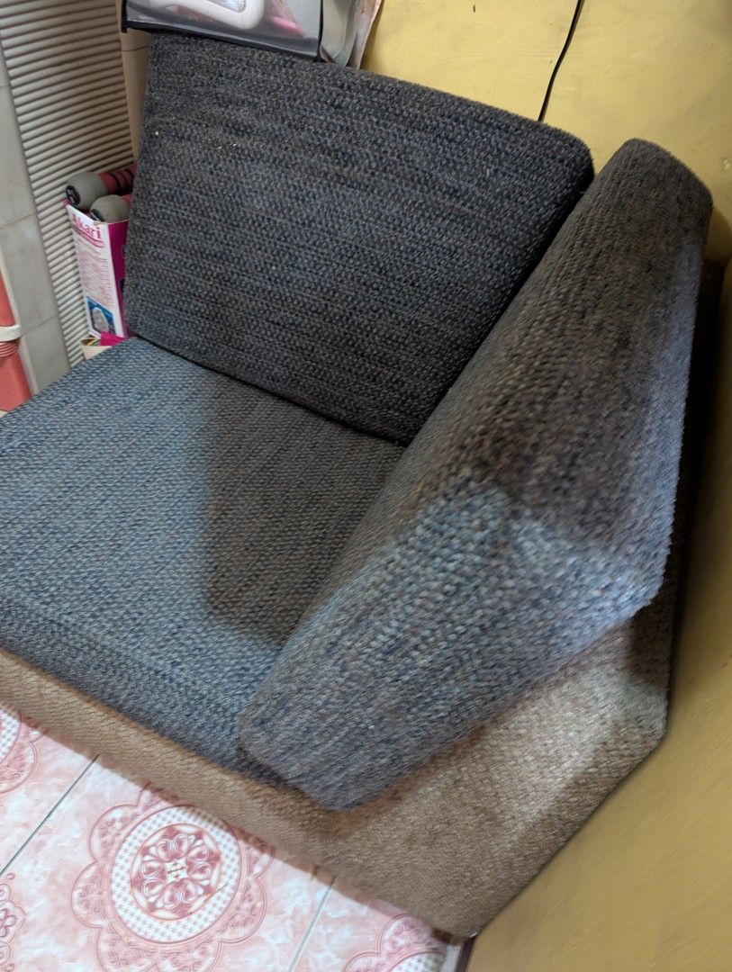 Corner Sofa (Category: Sofas) located in Marikina City. Submitted by beybera (Listing ID 1410401354, Image 1). Description: - Two-tone design: Gray seat/back, tan base. - Angular, space-saving shape. - Compact size, ideal for small living areas. - Well-constructed for comfortable seating. - Perfect as an accent piece. More details: never actually got to use this corner sofa. I admit I don't want to let go since it's REALLY NICE. pero no space na 