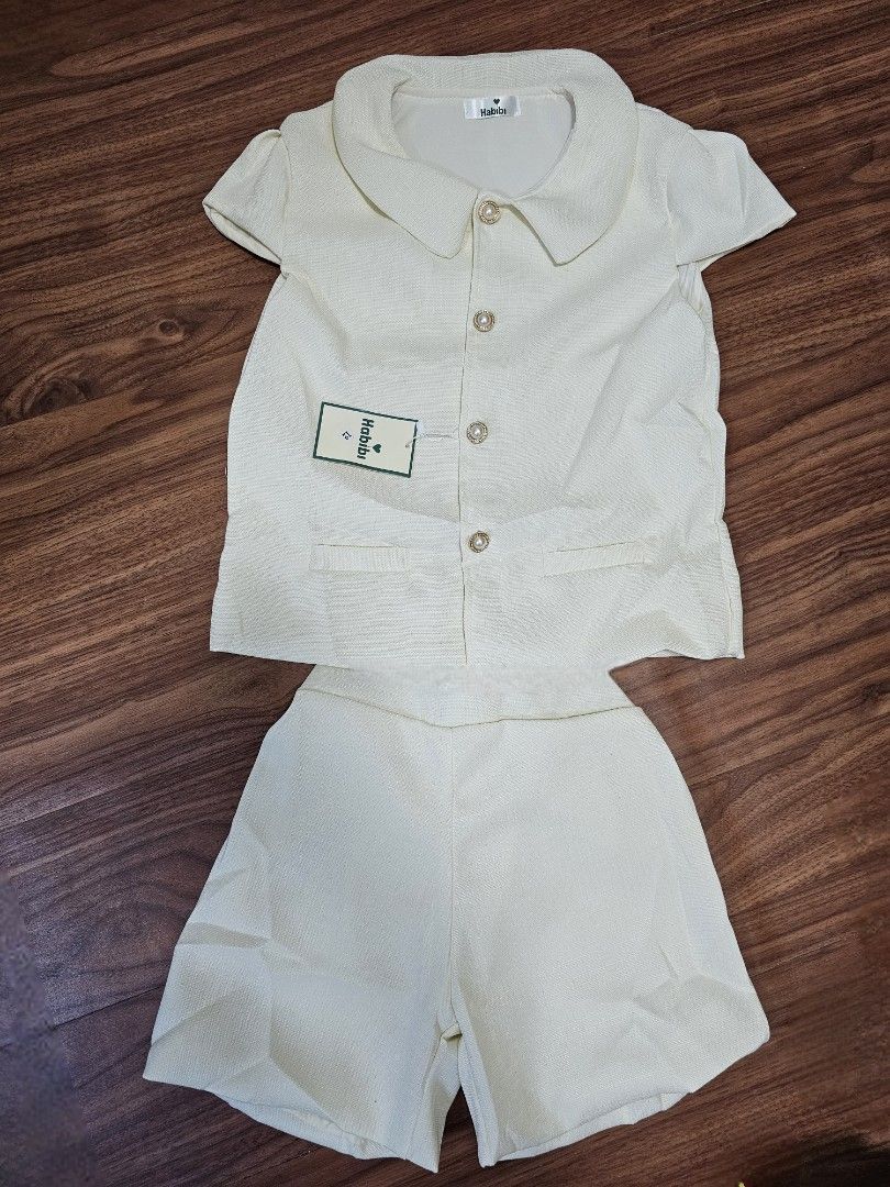 Cream Linen Blouse and Shorts Set (Category: Babies & Kids Fashion) located in Cebu City. Submitted by bambam10 (Listing ID 1410382832, Image 2). Description: Size: 10-12 years old Brandnew.