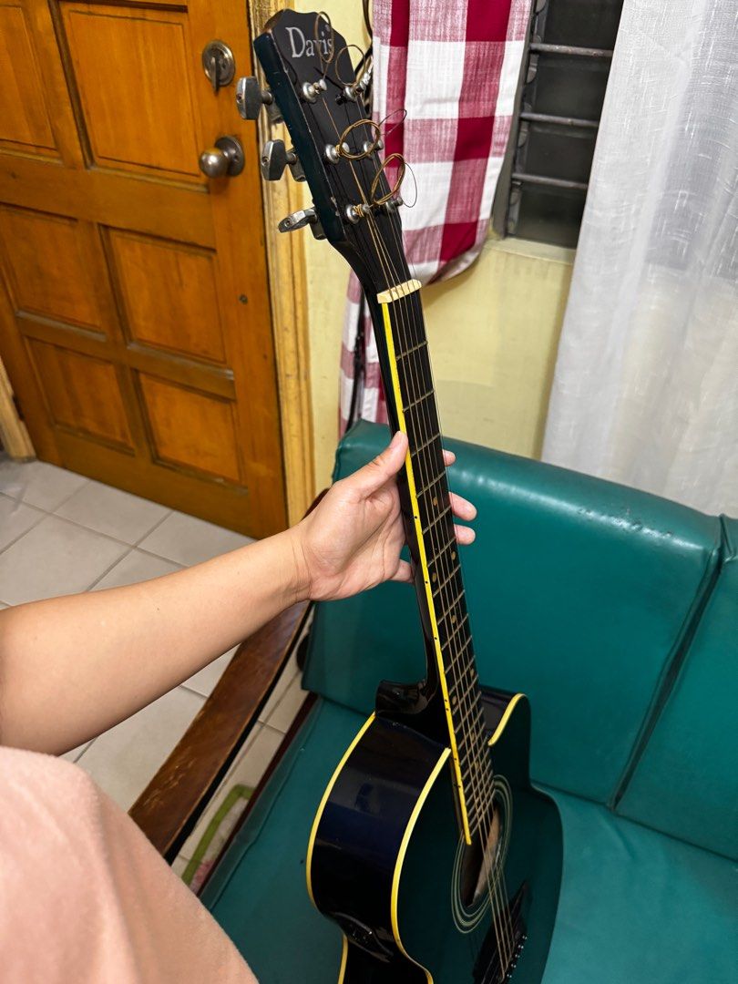 Davis Acoustic Guitar (Cutaway) – Good Condition (Category: Musical Instruments) located in Manila. Submitted by scout1129 (Listing ID 1410525636, Image 3). Description: - Good playing condition - No cracks or major issues - Tuners working, normal signs of age - No pickup (pure acoustic) - Includes used guitar cover - Great for beginners, students, or practice guitar. - Meet-up only. - Buyer may inspect and test before payment. - Cash preferred..