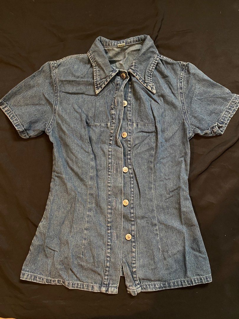 Denim Button-down Top Shirt Short Sleeve (Category: Sleeveless) located in Malabon City. Submitted by declutteredbycole (Listing ID 1410384952, Image 1). Description: no issue fits small, women's color: faded denim blue in actual.