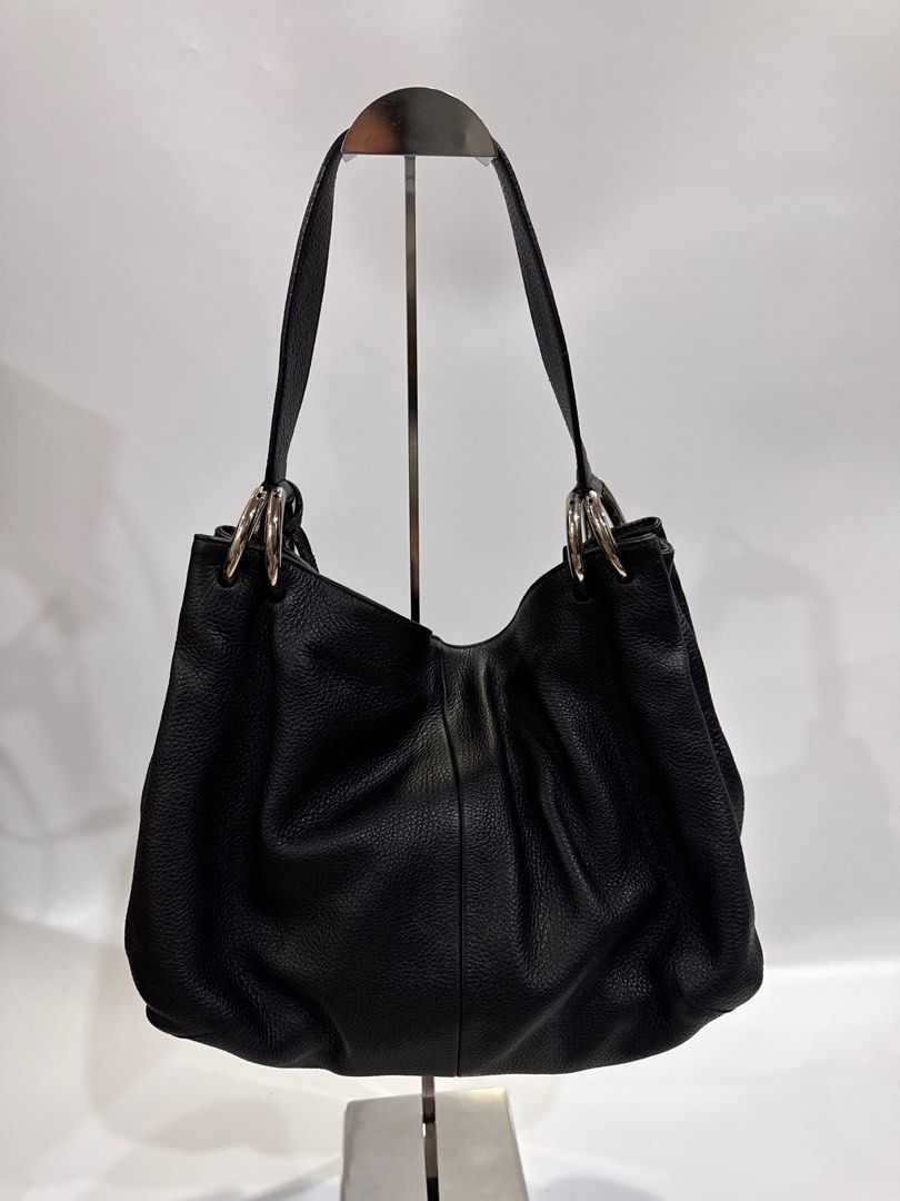 Furla Black Leather Hobo Bag (Category: Luxury Bags & Wallets) located in Davao. Submitted by stellietas (Listing ID 1410535652, Image 3). Description: Size: 14L x 10H x 5.5W inches No flaws, Excellent condition, with signs of use minimal on the rubber linning of the edges part of the handle. Black Genuine leather. Clean interior. Bet❤️❤️.