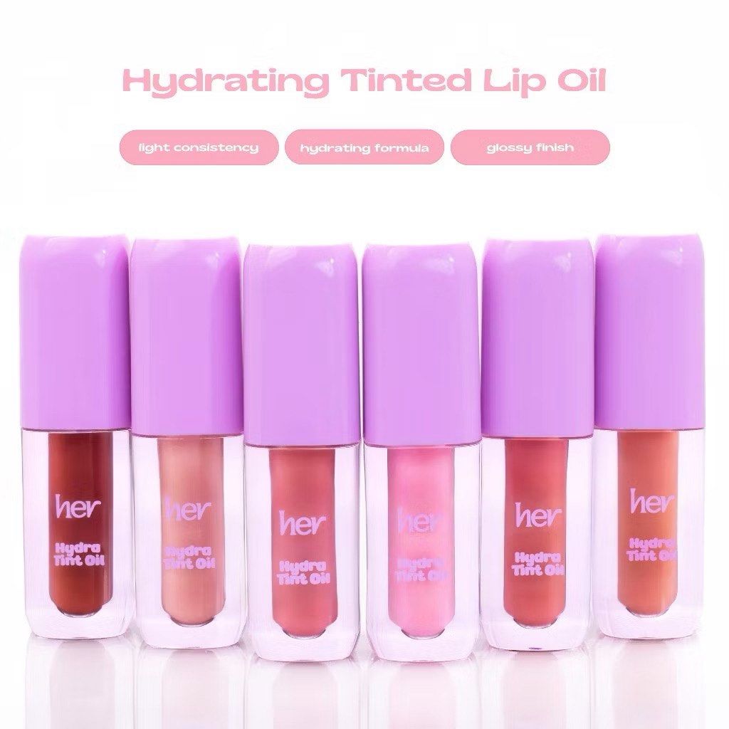 Her Hydra Tint Lip Oil (Category: Makeup) located in Quezon City. Submitted by shopnina (Listing ID 1410479478, Image 1). Description: Hydra Tint Oil is a hydrating, buildable tinted lip oil that nourishes your lips with a natural, glossy finish. The lightweight, non-sticky formula provides a burst of hydration while delivering a subtle hint of color that can be layered for a more intense look. SRP: ₱199 •₱88 only! •plus pasabuy fee: ₱20 •brand n