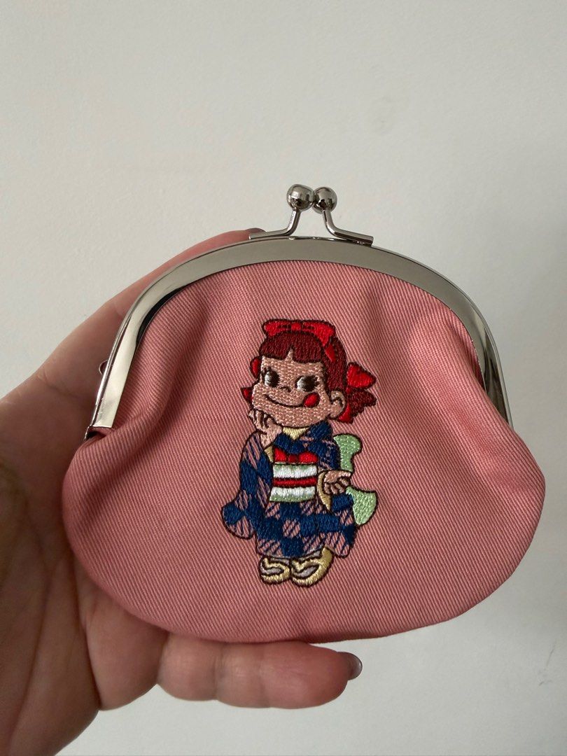 Japan 🇯🇵 limited Peko milk girl gamaguchi/ purse (Category: Purses & Pouches) located in Singapore. Submitted by andthenublink (Listing ID 1410484349, Image 1). Description: Brand new from Japan Includes smart pac .