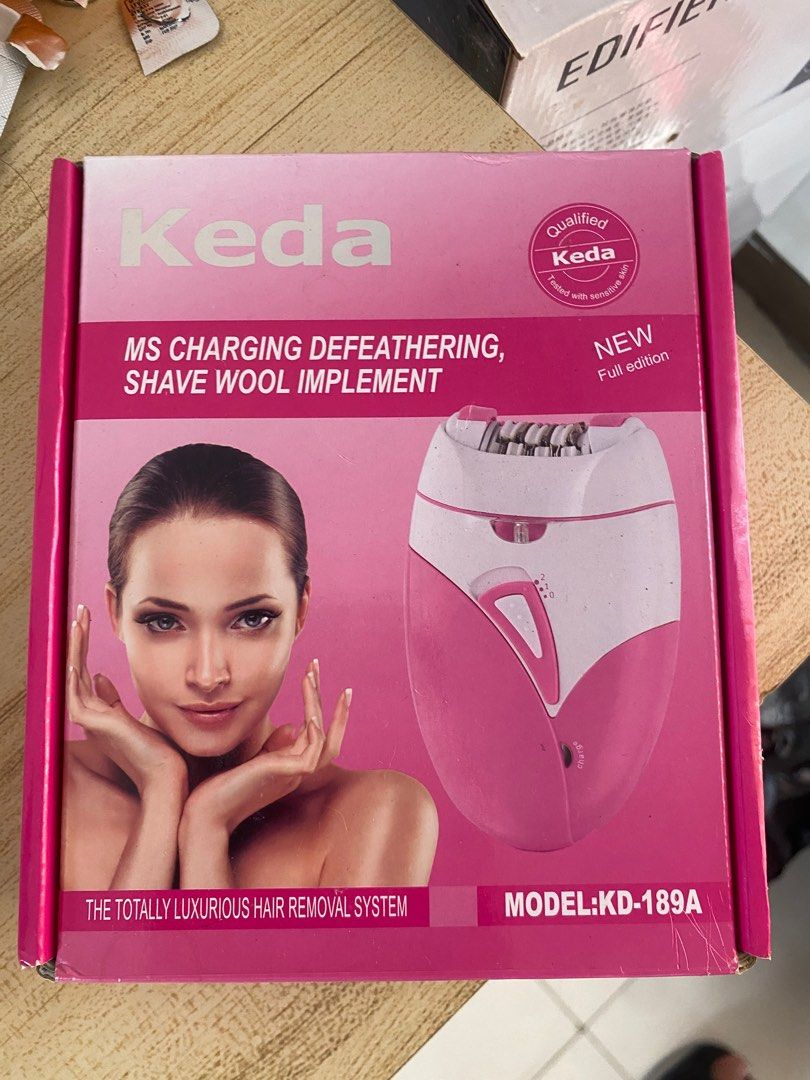 Keda Epilator (Category: Hair Removal) located in Cainta. Submitted by kimisselling (Listing ID 1410407030, Image 2). Description: Just used this once. Already cleaned and sanitized para hindi naman kadiri. Inclusions - box - charging cable - brush.