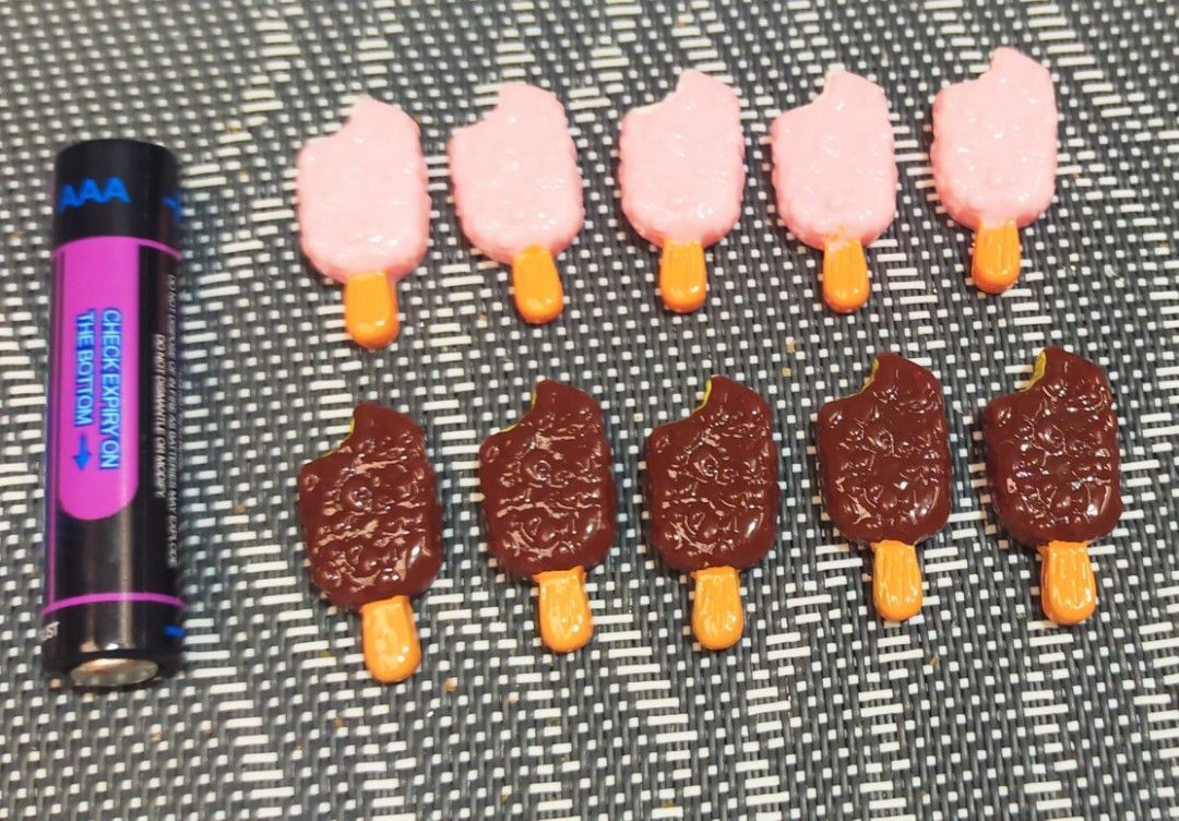 Miniature Drink and Ice Cream Charms (Category: Charms) located in Dipolog. Submitted by queenibee01 (Listing ID 1410379914, Image 2). Description: Adorable miniature charms featuring drink and ice cream designs. The drink charms include lemon slices and panda designs. The ice cream charms come in pink and chocolate colors. These charms are perfect for crafting or adding a cute touch to your accessories..