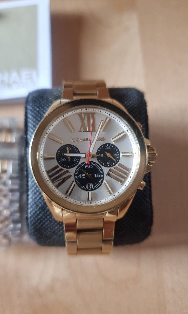 MK gold hardware Watch (Category: Luxury Watches) located in Bulacan. Submitted by iamolivia_p (Listing ID 1410375565, Image 3). Description: Comes with box, extra strap.
