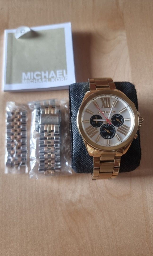 MK gold hardware Watch (Category: Luxury Watches) located in Bulacan. Submitted by iamolivia_p (Listing ID 1410375565, Image 2). Description: Comes with box, extra strap.