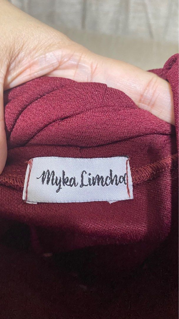 Myka Limchoc Maroon Top (Category: Blouses) located in Marikina City. Submitted by creatingmorespace (Listing ID 1410514234, Image 2). Description: - Myka Limchoc top - Maroon color - Cowl neck design - Short sleeves - Textured fabric - Very elegant when worn - Fits to M to L - Harlan + Holden Inspired.