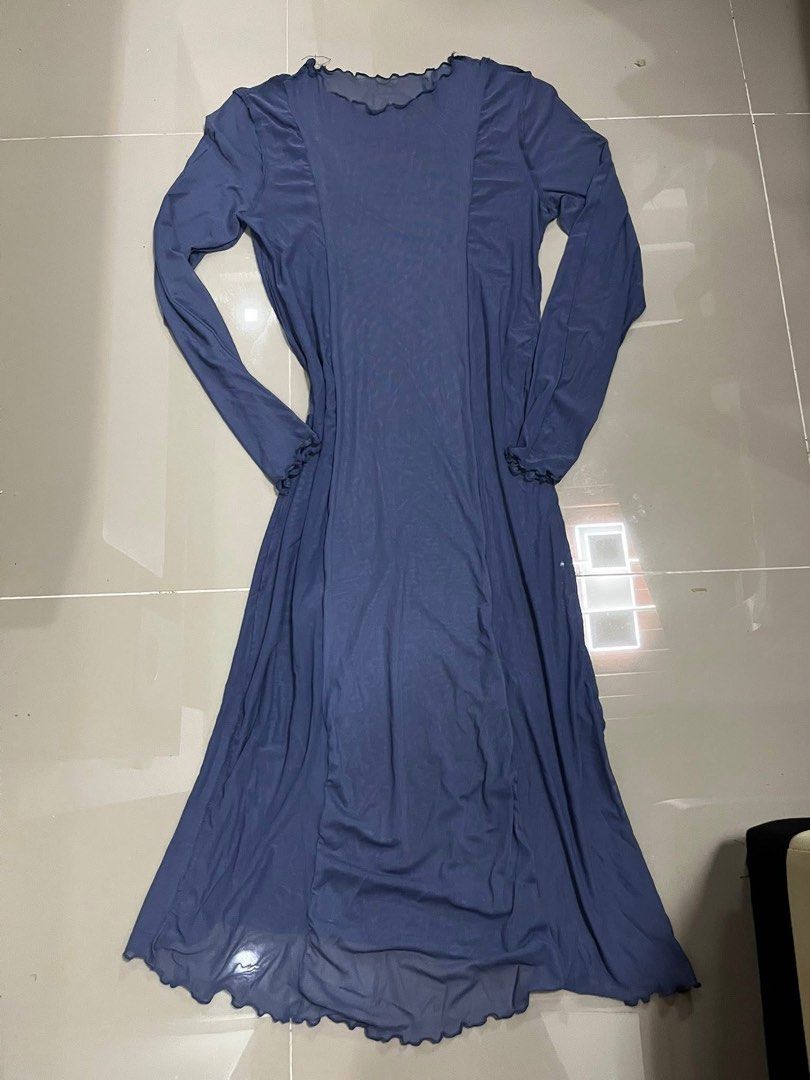 Navy Blue Mesh Overlay Dress (Category: Dresses) located in Cavite. Submitted by emory_015 (Listing ID 1410541463, Image 2). Description: Elegant navy blue dress with a mesh overlay. Features long sleeves and a flowing silhouette. The dress has a round neckline with a ruffled edge. The mesh overlay adds a delicate touch. Perfect for special occasions or a night out. Best fit small to med body frame Payment first basis ( BPI | GCASH ) ✨ SEND PROOF
