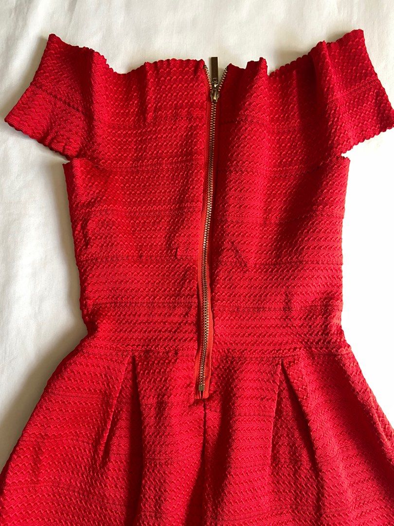 Red Textured Off Shoulder Dress (Category: Dresses) located in Bulacan. Submitted by thriftbin (Listing ID 1410389430, Image 3). Description: - quality textured fabric - fitted waist, flattering cut - back zip closure - great for christmas, dinner, events! size: bust 26" (strechable) waist 23-26" length 26" from shoulders No when worn pic ‼️Fixed price *ONLY OFFER IF SURE BUYER ship via J&T / sdd loc: bulacan .