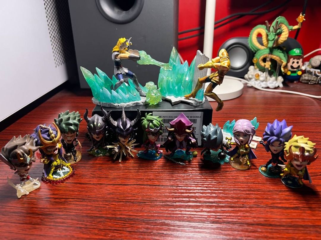 Saint Seiya Mini Figures Set (Category: Figurines & Statues) located in Baguio. Submitted by ditoyzb08176 (Listing ID 1410505160, Image 2). Description: - Saint Seiya Mini Figure Set - Includes multiple characters - Detailed poses and special effects - Features a battle scene with crystal formations - Displayed on a wooden surface -WSIWYG -Location: Baguio City Shipping: J&T/FLASH/LBC.