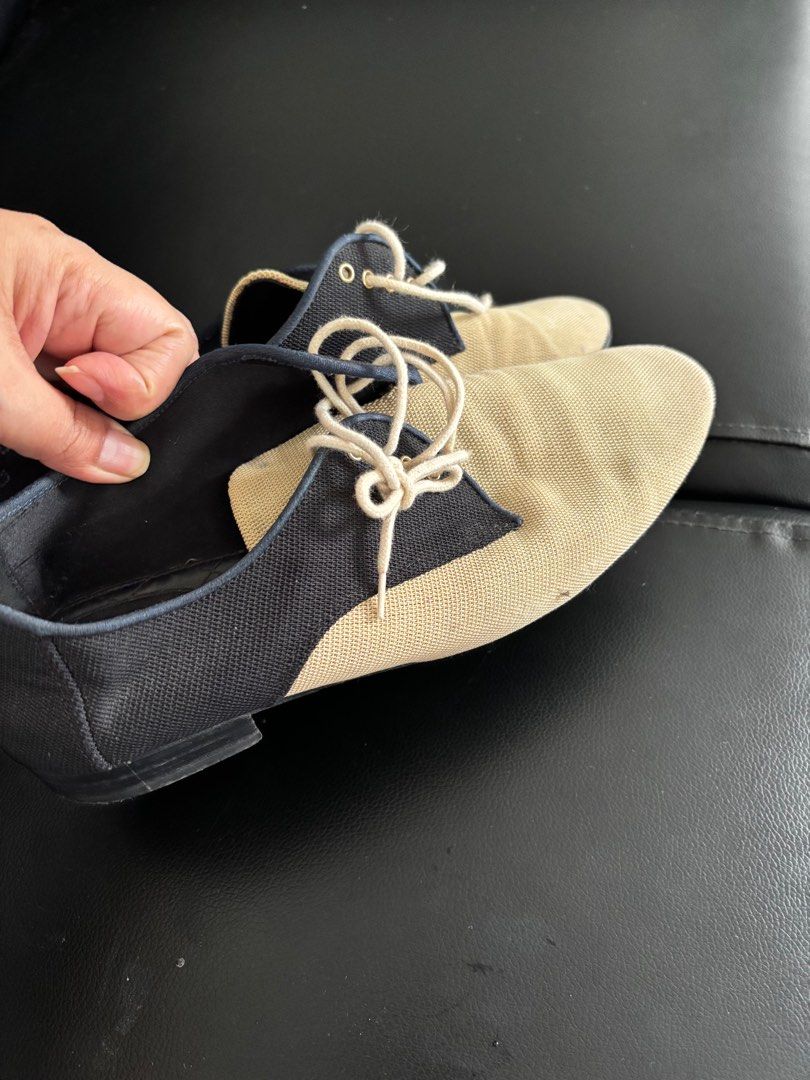 Sale!!!Authentic chanel shoes (Category: Sneakers & Footwear) located in Paranaque City. Submitted by dheng07 (Listing ID 1410381300, Image 3). Description: - Authentic Chanel lace-up shoes - Two-tone design: beige and black - Features Chanel logo - Size: 38.5C - Made in Italy - Quilted insole with Chanel logo - Includes original laces.