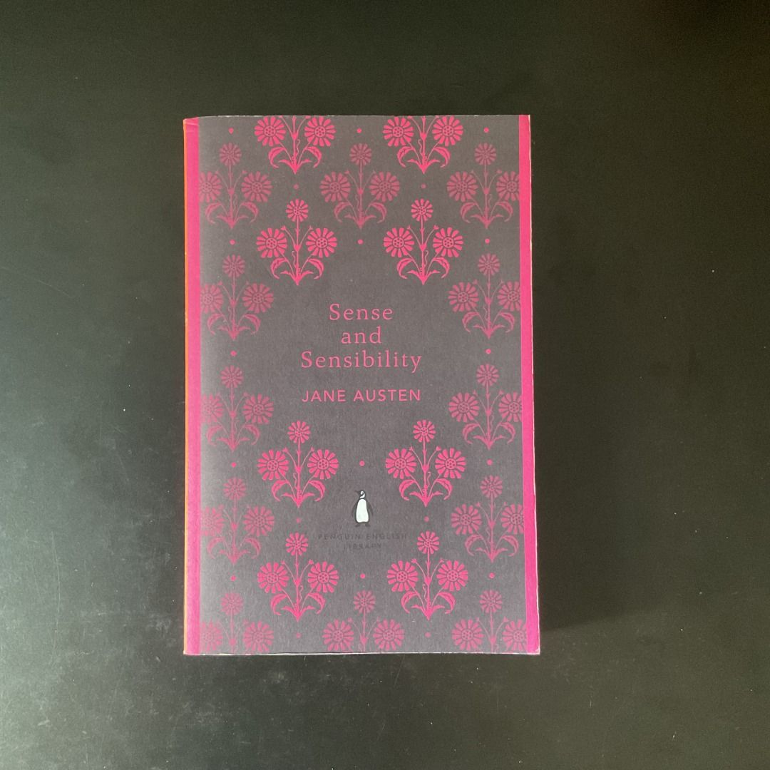 Sense and Sensibility by Jane Austen (Category: Storybooks) located in Mandaluyong City. Submitted by ynomaki (Listing ID 1410388337, Image 1). Description: Copy of Jane Austen's classic novel, "Sense and Sensibility." Published by Penguin English Library. The book features a decorative cover with a floral pattern in pink and gray. The back cover includes a brief summary of the story. The spine is visible, and the pages appear to be intact..