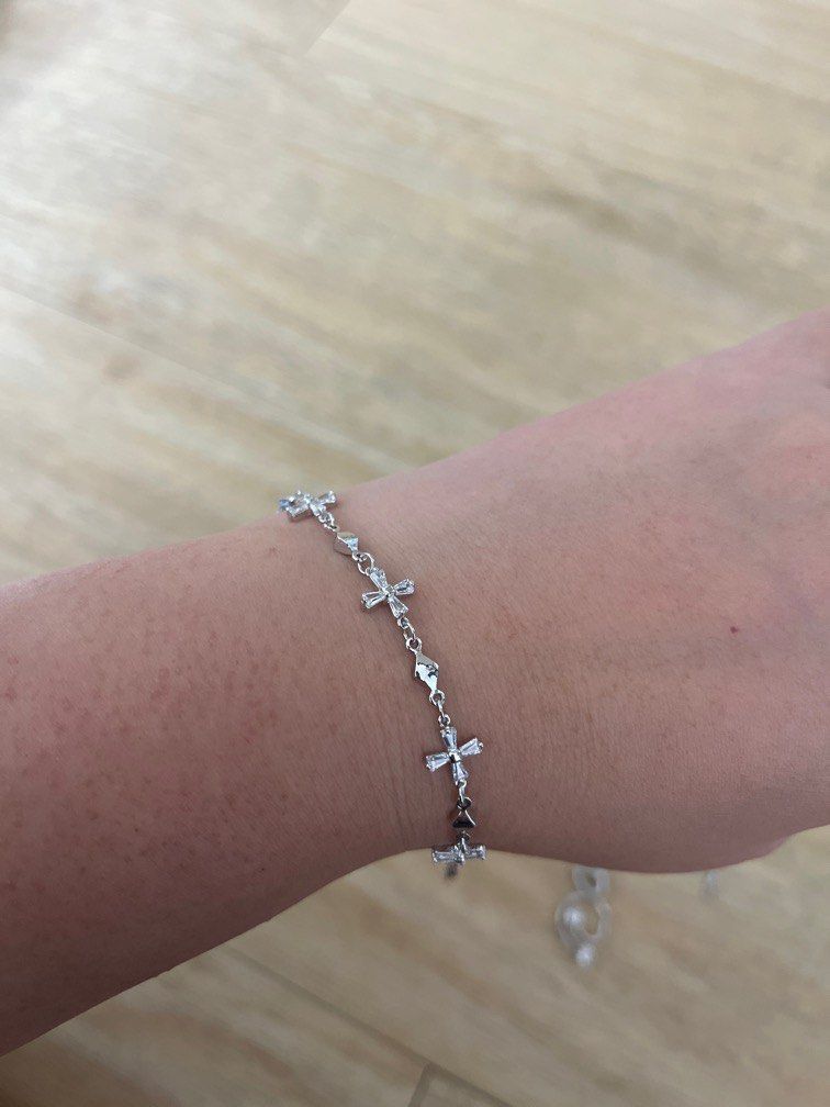 Silver bracelets (Category: Bracelets) located in Singapore. Submitted by brightfire_09ad67 (Listing ID 1410399863, Image 2). Description: Silver bracelets used only once. Still in mint condition. $20 for both, Will throw in the necklace for free (chain needs a bit of polishing) Price negotiable for fast deal at my convenience.
