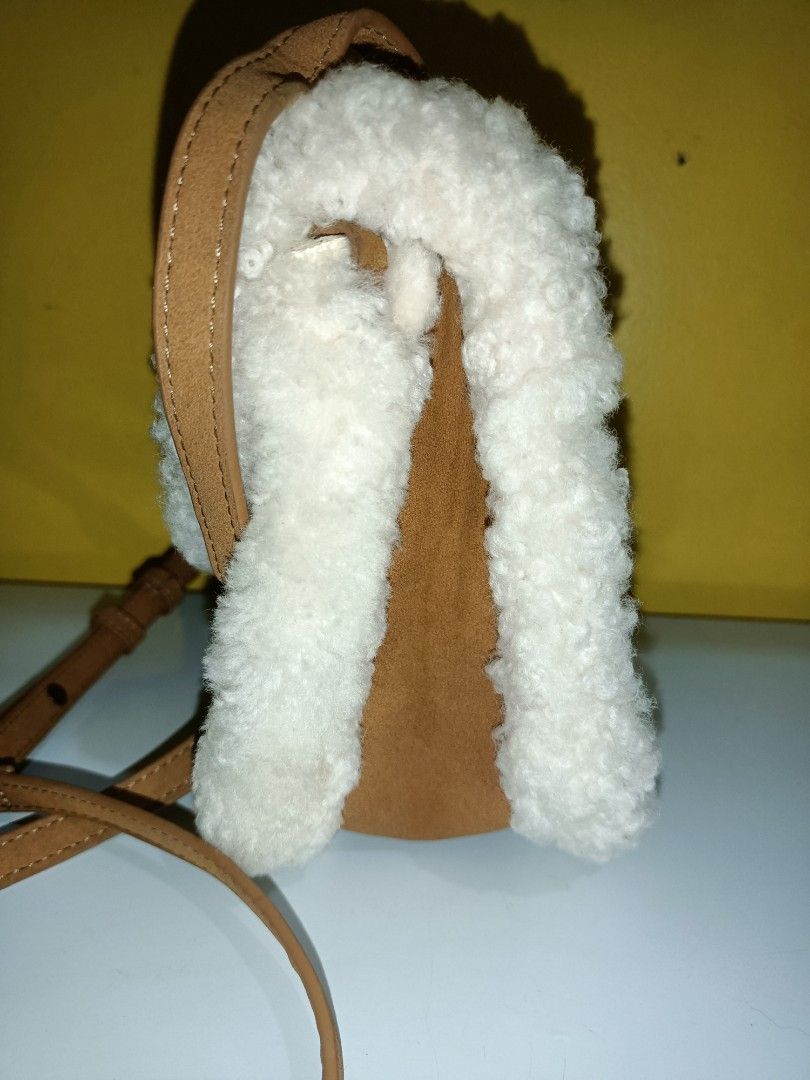 UGG Heritage Suede Crossbody Bag (Category: Cross-body Bags) located in Bolinao. Submitted by shayne_0215 (Listing ID 1410525265, Image 2). Description: Slightly Negotiable No Flaws Only needs cleaning on the inside lining MOP: GCASH.
