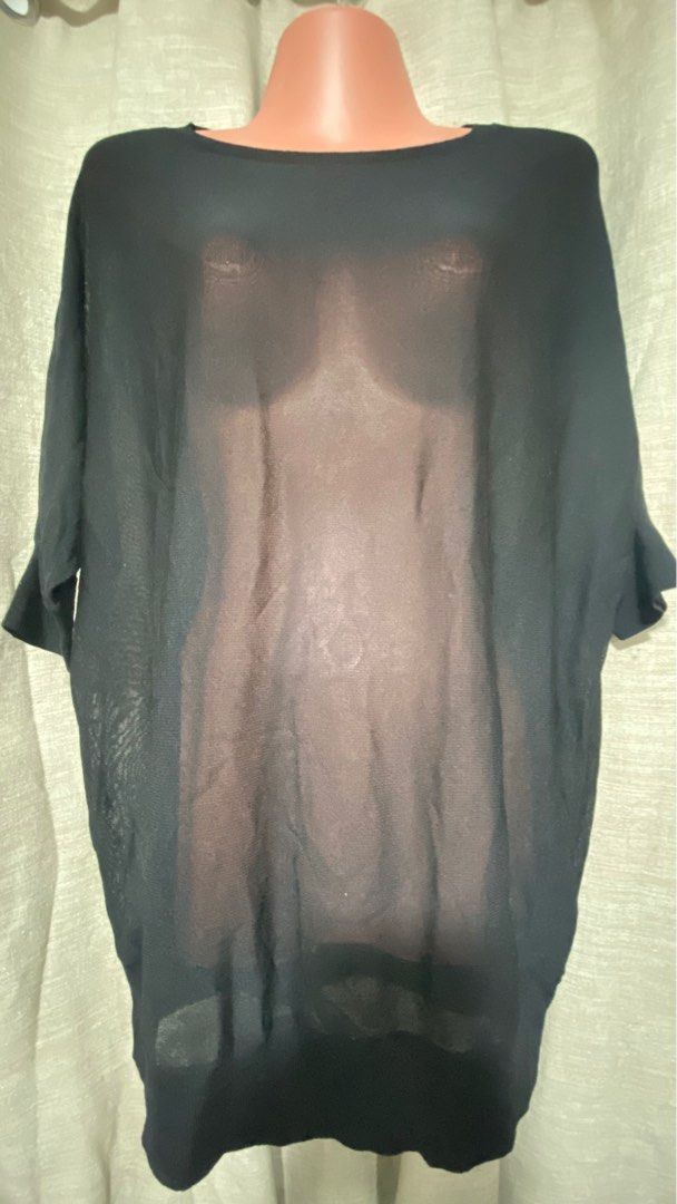 Uniqlo Black Top XL (Category: Blouses) located in Marikina City. Submitted by creatingmorespace (Listing ID 1410510524, Image 1). Description: - Uniqlo black top - Size: XL - Neckline: Round - Sleeves: Long - Material: Sheer - Style: Versatile, can be dressed up or down - Can be worn in different occasions, beach as cover up, casual with black spaghetti top inside or night outside with preferred black inner.