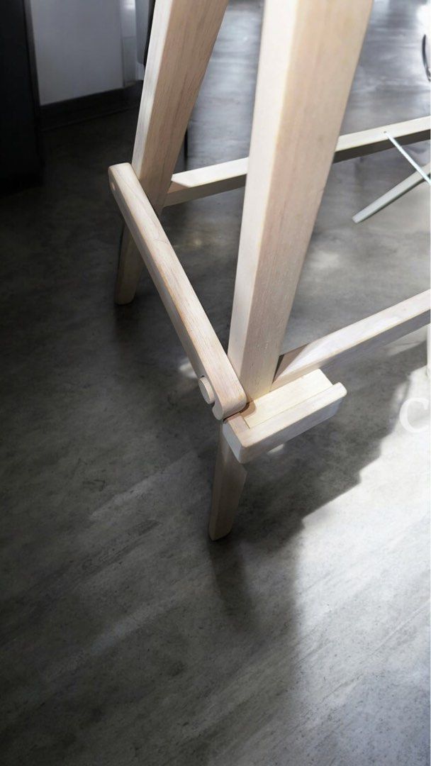 Wooden Easel (Category: Art & Prints) located in Batangas. Submitted by rnd_collectibles08 (Listing ID 1410411478, Image 3). Description: - Wooden easel for artwork display. - Sturdy, natural wood frame. - Adjustable legs for stability. - Holds canvases and framed pieces. - Simple, elegant design. - Folds for easy storage. with BOX 4pcs Available.