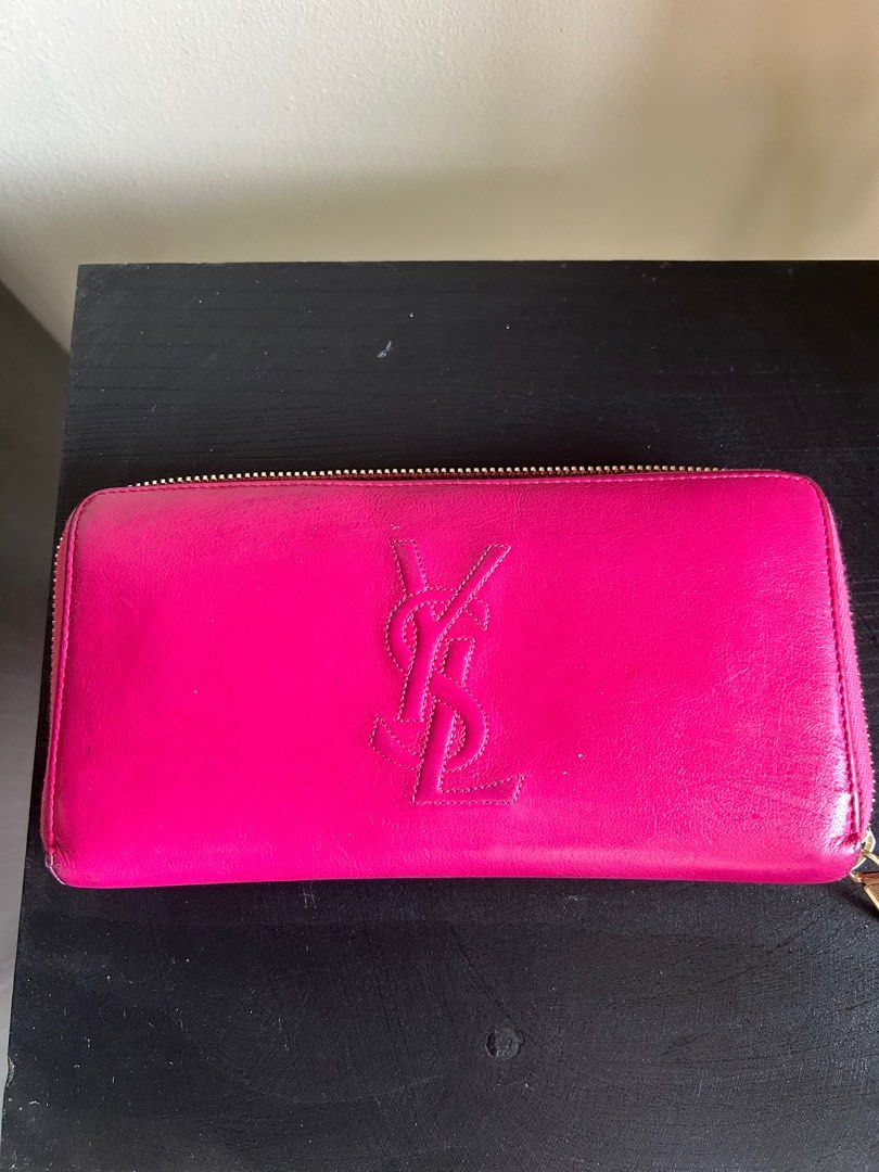 YSL dark pink wallet (Category: Luxury Bags & Wallets) located in Makati City. Submitted by ajoloso_69 (Listing ID 1410491970, Image 1). Description: .