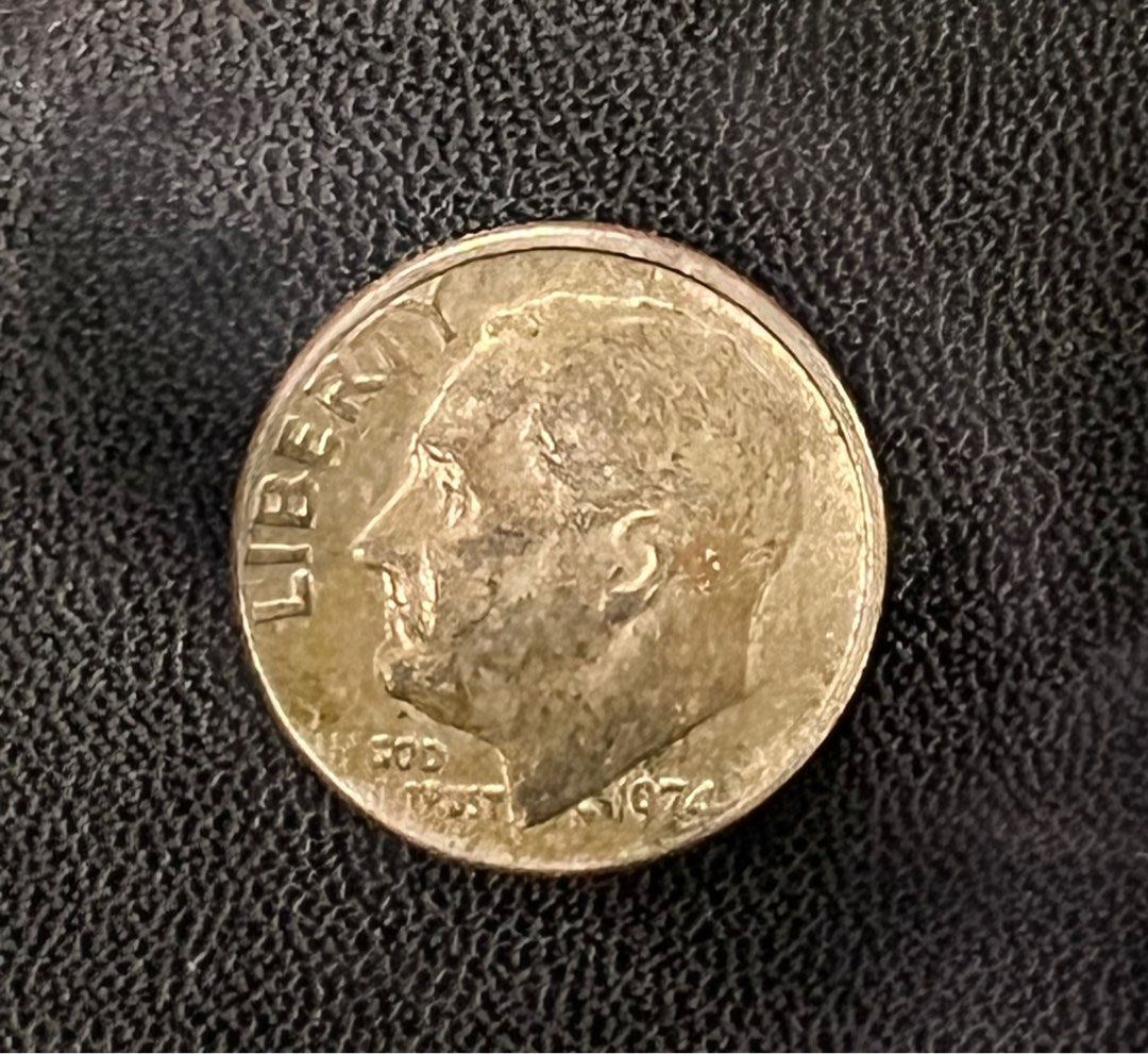 1974 Roosevelt Error Dime - Multiple errors (Category: Currency) located in Taguig. Submitted by kghobbies (Listing ID 1410715833, Image 1). Description: CA are connected The W is halved Face side is off center.