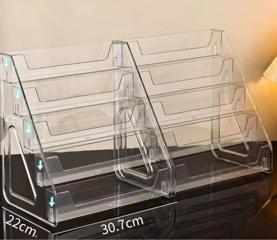 Acrylic Display Organizer/ Post Card Display stand (5 layers) (Category: Storage Boxes & Baskets) located in Cuyapo. Submitted by the.resettt (Listing ID 1410644576, Image 1). Description: - Clear acrylic display organizer - Multiple tiers for organization - Dimensions: 30.7cm (Length) x 22cm (Height) x 3.7cm (Depth) - Transparent design for easy visibility - Ideal for displaying various items - 5 layers.