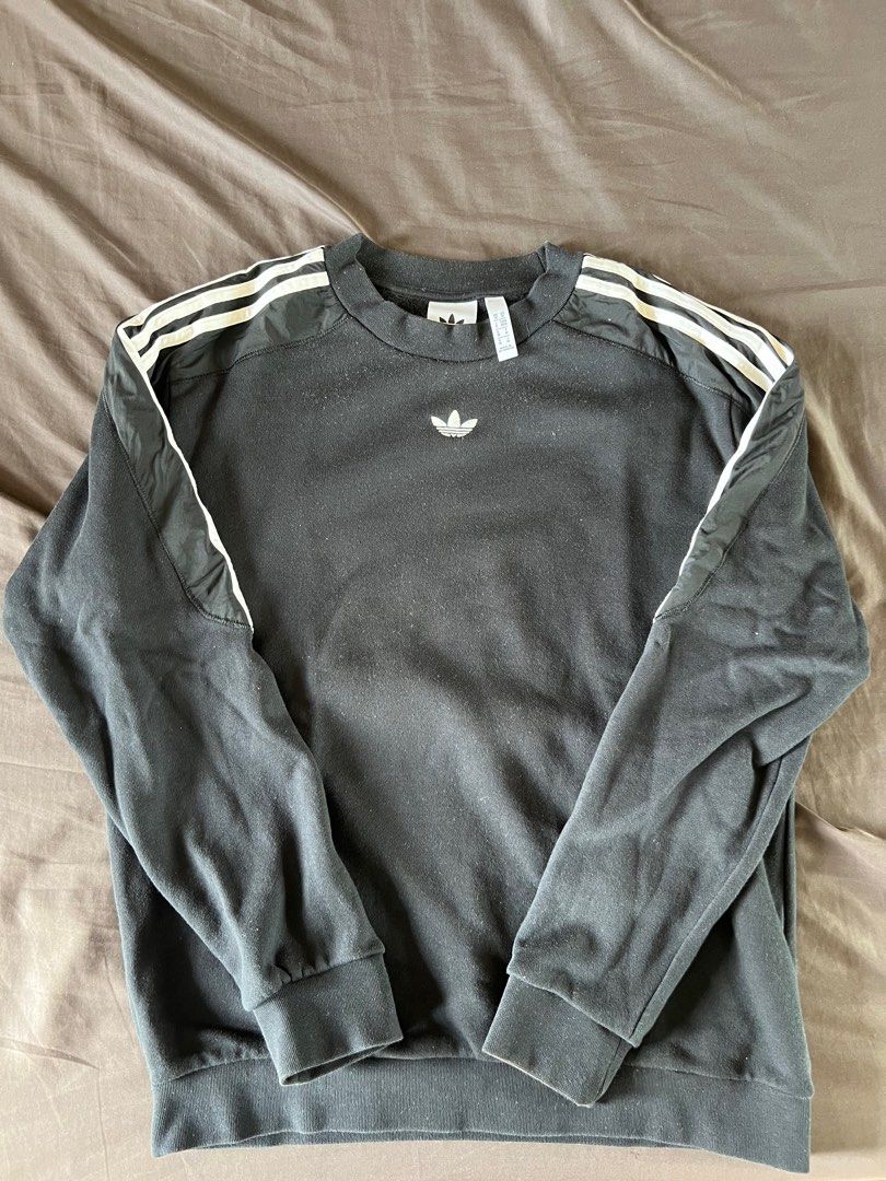 Adidas Black Sweatshirt with Stripes (Category: Longsleeves) located in Mandaluyong City. Submitted by minimalmeowguy (Listing ID 1410567093, Image 1). Description: - Adidas sweatshirt - Black with white stripes - Adidas logo on chest - Size: M - Made in Myanmar - Details are in the photos.