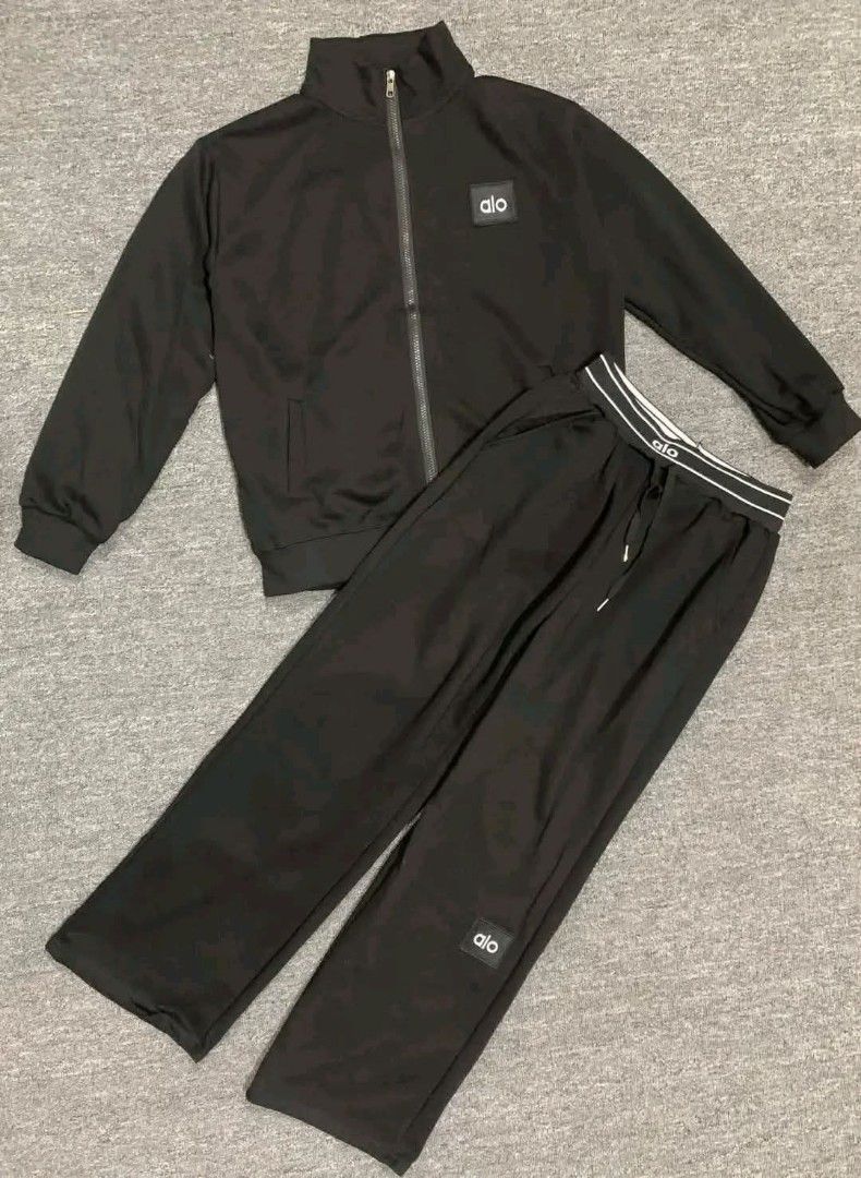 Alo Yoga Tracksuit Set (Category: Activewear) located in Manila. Submitted by raredeer-4deb4e (Listing ID 1410571356, Image 1). Description: - Alo Yoga tracksuit set - Includes zip-up jacket and matching pants - Features Alo logo - Pants with drawstring waist and contrasting waistband - Available colors: Black, Cream, Burgundy, Grey - Ideal for workouts and casual wear.