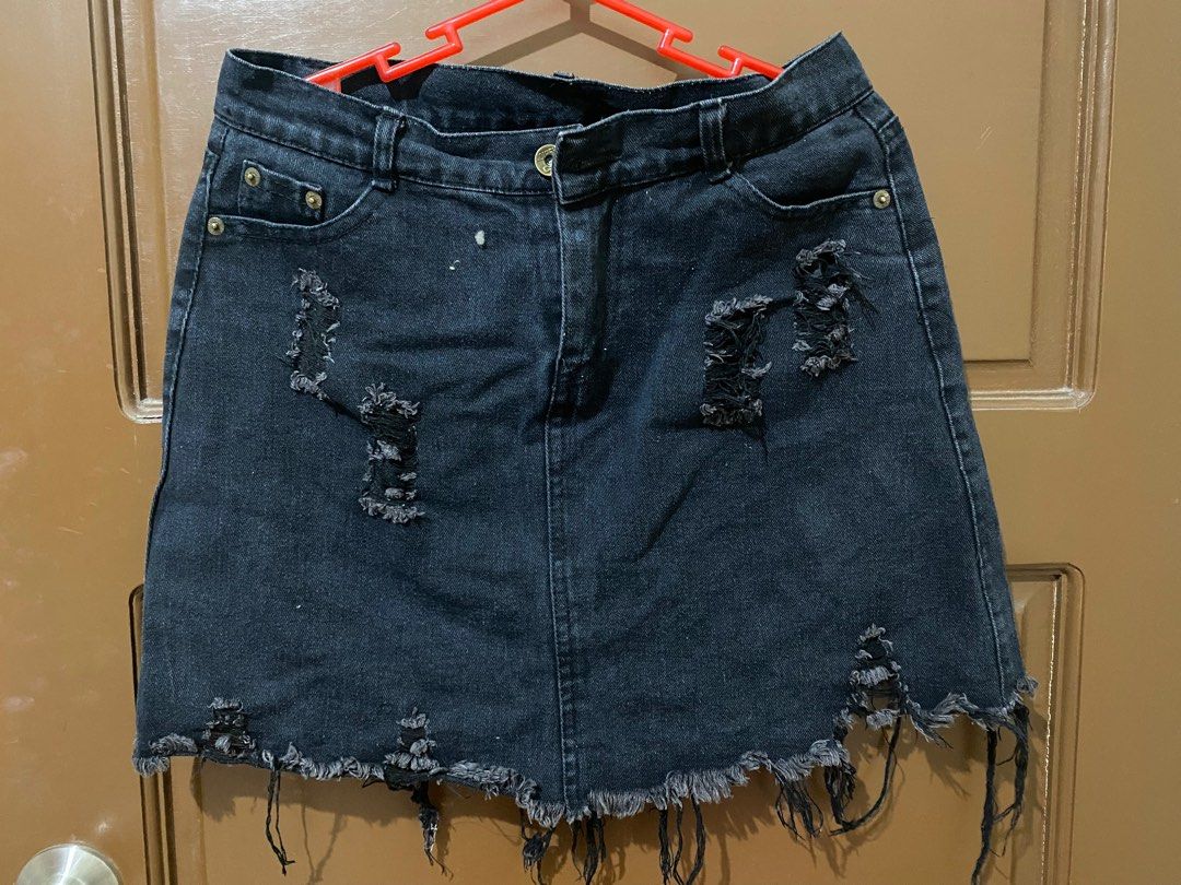 Black Denim Distressed Skirt (Category: Skirts) located in Manila. Submitted by lachicahermosa (Listing ID 1410579757, Image 2). Description: - Black denim mini skirt - Distressed detailing - Button and zipper closure - Front and back pockets - Frayed hem - Classic five-pocket design - Mini length.