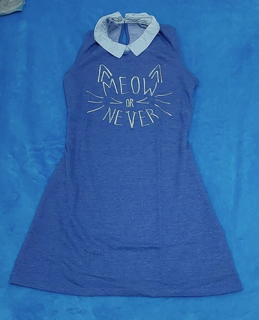 Blue Cat Print Dress (Category: Dresses) located in Manila. Submitted by summerd (Listing ID 1410628451, Image 2). Description: I used this 2x only (photo posted). Flexible day, night, summer, casual, or occasion dress. Very cute :) - features a white collar and a cat-themed print that says "MEOW OR NEVER". Size: Approx fits S to semi L [(L on tag but it fits me although I'm size S, see photo posted)] * DELIVERY/SHIPPING (shouldered by buyer): vi