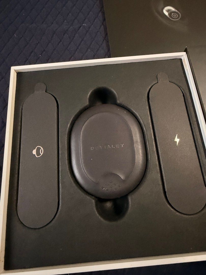 Devialet Gemini (Category: Earphones) located in Singapore. Submitted by twikz23 (Listing ID 1410607909, Image 4). Description: The Devialet Gemini 1 (or original Gemini) is a premium set of true wireless earbuds known for bringing Devialet’s acclaimed audio engineering into a portable format, featuring strong Active Noise Cancellation (ANC), Ear Active Matching (EAM) for personalized sound, IPX4 water resistance, aptX codec support, and a comfor