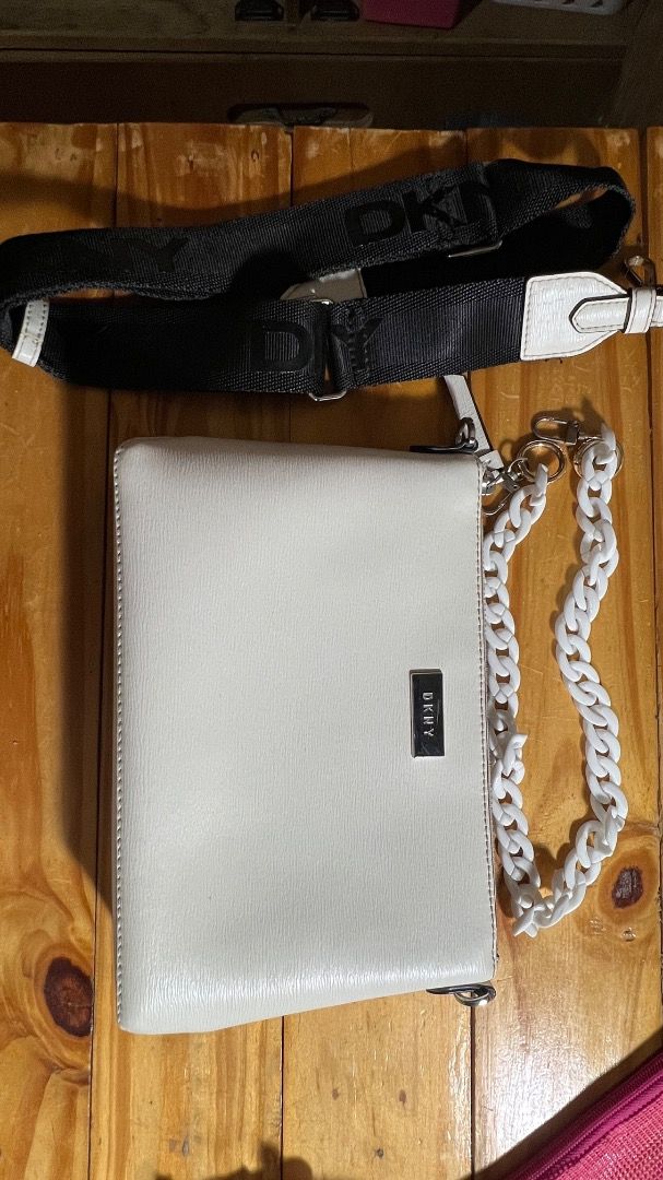 DKNY White Bag (Category: Cross-body Bags) located in Lipa City. Submitted by declutterstuff123 (Listing ID 1410712254, Image 2). Description: Used twice. ⭕️Everything Must Go! ⭕️Grouped items are for TAKE ALL. No individual selling. ⭕️All items sold as is basis. Manage expectations based on pictures. No return, no exchange. ⭕️SF will be shouldered by the buyer. Meet Ups - Makati: Ayala Circuit/JP Rizal/Makati City Hall Lipa City: SM City Lipa De