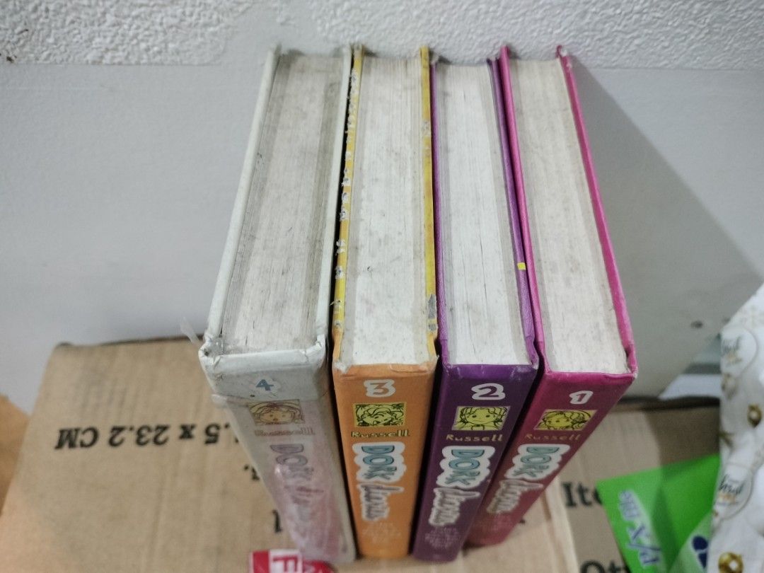 Dork Diaries Books Set HARDBOUND (Category: Children's Books) located in Manila. Submitted by chiki_chem (Listing ID 1410555056, Image 2). Description: - Dork Diaries book set (Volumes 1, 2, 3, and 4). - Features colorful spines with the Dork Diaries logo and character illustrations. - Perfect for a new reader! - Complete set..