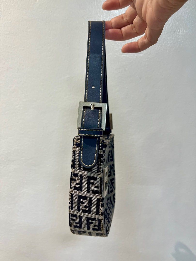 Fendi Zucca Mini FF Plaque (Croissant) Bag (Category: Luxury Bags & Wallets) located in Manila. Submitted by seagypseaph (Listing ID 1410633675, Image 3). Description: 20% OFF! Happening from May 18-25! OG Price: Php7,200 Fendi 1990-2000s Zucca Mini FF Plaque Vintage Bag - Iconic FF logo pattern - Navy blue leather strap - Silver-toned hardware - Crescent shape with rectangular base - Nano size Price negotiable. DM me! Rank: A-AB (Very good - to 