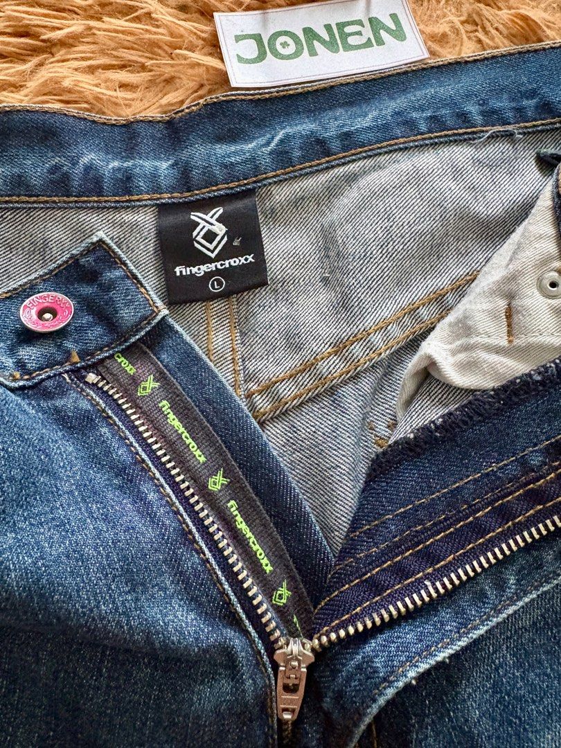 Fingercroxx Jeans (Category: Jeans) located in Cavite. Submitted by SOLEBEN (Listing ID 1410582021, Image 3). Description: Fingercroxx Regular Fit Jeans Actual Measurements: W-33 Inseam-30 Hem-7.5 Total Length-42 Color may vary due to lighting. .