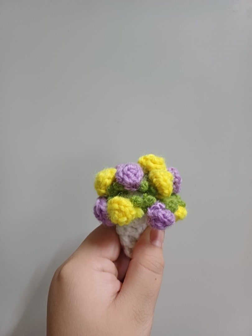 Flower Coaster (Category: Handmade Craft) located in Singapore. Submitted by maydoraemon (Listing ID 1410578564, Image 2). Description: Handmade Crochet Flower Coaster in sweet purple and yellow colors. Colors can be customized. Great as a gift..