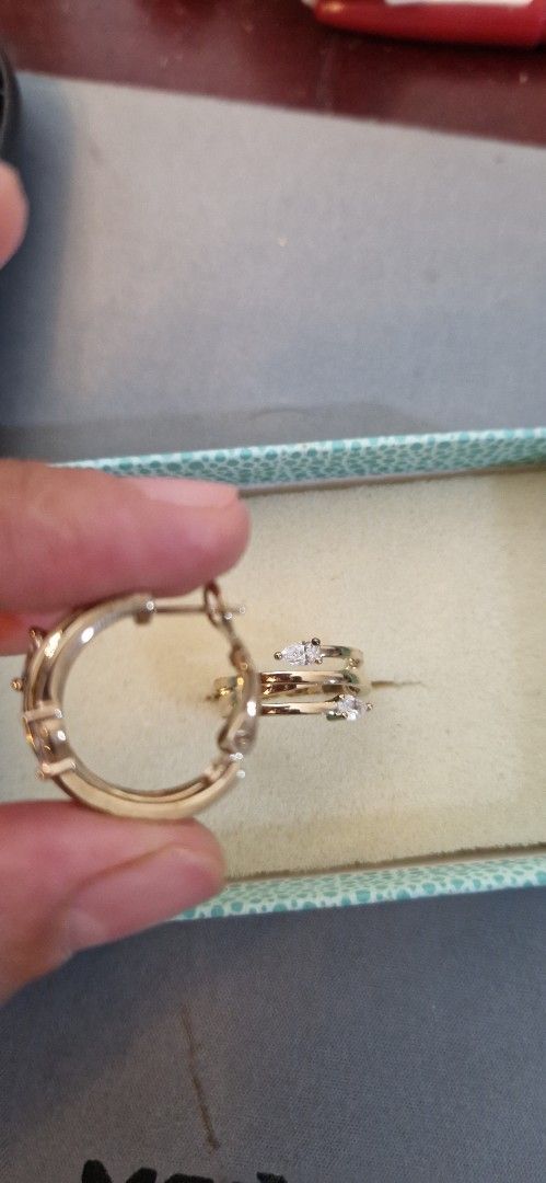 Gold Hoop Earrings with Diamonds (Category: Earrings) located in Rizal. Submitted by prelovedbymarlyn (Listing ID 1410601040, Image 3). Description: - Gold plated hoop earrings - Sparkling diamond accents swarovski crystals - Classic hoop design - Secure closure - Suitable for casual and formal wear.