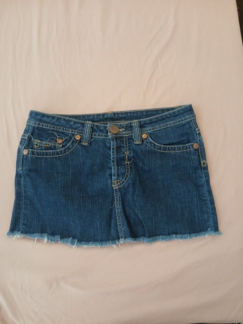 Grail Denim Mini Skirt - Size 27 (Category: Skirts) located in Paranaque City. Submitted by isimostar (Listing ID 1410675231, Image 1). Description: - Grail dark wash denim mini skirt - Size 27 - Classic five-pocket design - Raw hem - Made in USA - Material: 99% cotton, 1% spandex - Care instructions: Machine wash warm with like colors, tumble dry low, do not bleach.